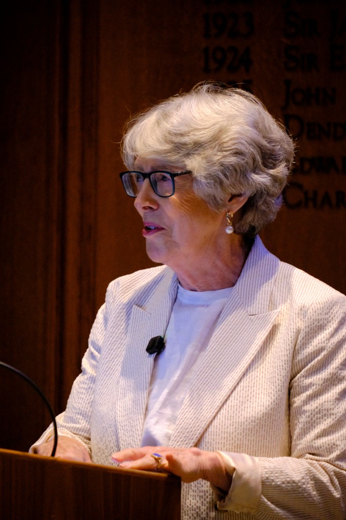 Dame Patricia Hewitt speaking at the podium during the RICS report launch